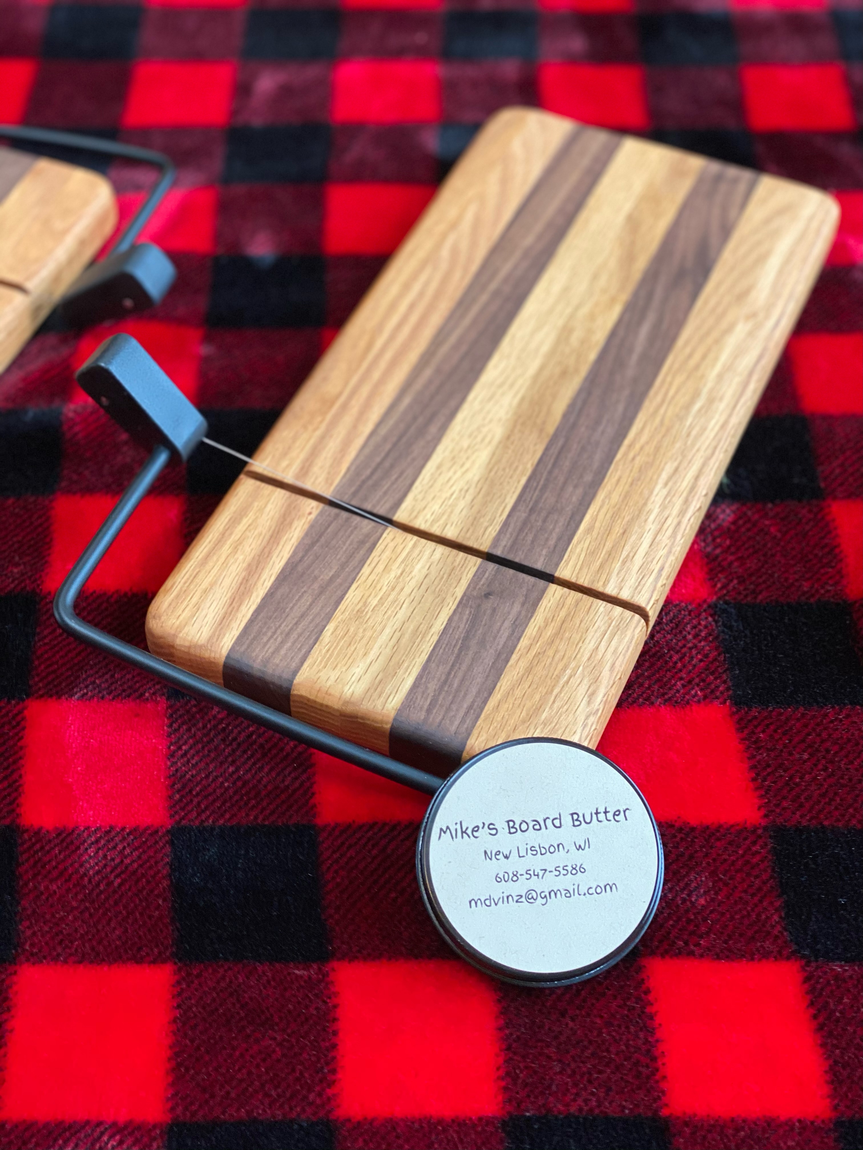 Cheese cutter and board butter.